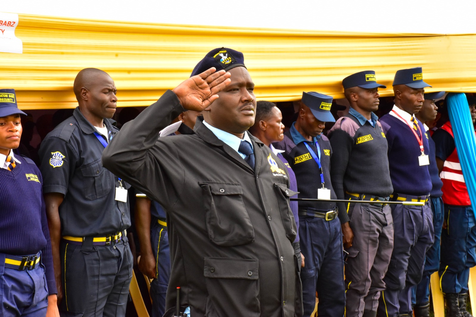 Gratom Babz supervisor saluting at a parade
